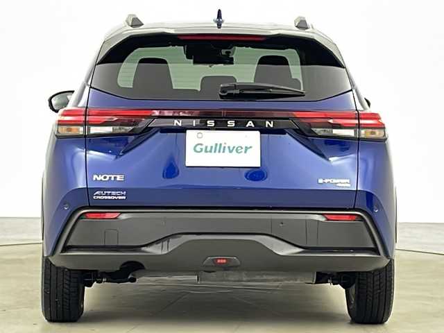 日産 ノート オーテック クロスオーバーFOUR 長野県 2022(令4)年 2.8万km オーロラフレアブルーパール ・４ＷＤ/・ワンオーナー車/・純正ナビ＆ＴＶ＆ＢＴ＆ＤＶＤ＆ＣＤ/・全方位カメラ/・エマージェンシーブレーキ/・車線逸脱警報/・車線逸脱防止支援/・後方車輛検知警報/・後側方衝突防止支援/・標識検知支援/・駐車支援/・後退時車両検知警報/・ふらつき警報/・寒冷地仕様/・レザー調シート/・前席シートヒーター/・革巻きハンドル/・ステアリングヒーター/・ドアミラーウィンカー＆ヒーター/・オートライト/・オートマチックハイビーム/・ＬＥＤヘッドライト/・ＬＥＤフォグランプ/・社外前後ドライブレコーダー（ＳＮ－ＴＷ８４）/・純正リモコンスターター/・夏タイヤ純正オーテックアルミ付き積込