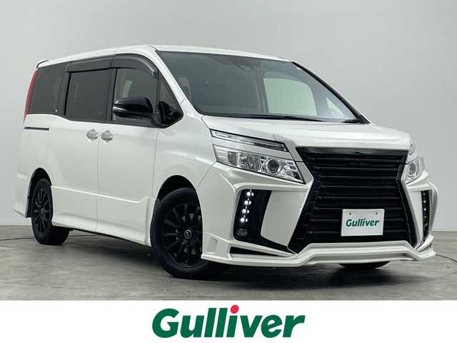 トヨタ ヴォクシー ZS 煌 群馬県 2016(平28)年 6万km ホワイトパールクリスタルシャイン 雹害車　フリップダウンモニター　純正９インチナビ　バックカメラ　両側パワースライドドア　ＬＥＤライト　ＡＨＢ　シートカバー　社外１６インチＡＷ　ステアリングリモコン　ドライブレコーダー　ＥＴＣ