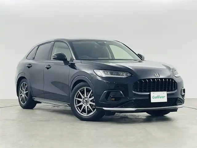 ホンダ ＺＲ－Ｖ ハイブリッド e:HEV Z 福島県 2023(令5)年 1.5万km クリスタルブラックパール 純正ディスプレイオーディオ/【Bluetooth/USB/AppleCarPlay/AndroidAuto/フルセグTV】/・全方位カメラ/・置くだけ充電/・BOSEサウンド/・ETC2.0/ホンダセンシング/・衝突軽減ブレーキ/・先行車発進お知らせ機能/・歩行者事故低減ステアリング/・路外逸脱抑制機能/・標識認識機能/・アダプティブクルーズコントロール/・ブラインドスポットモニター/・オートマチックハイビーム/レザーシート/・前席パワーシート/・前席シートヒーター/ステアリングスイッチ/・ステアリングヒーター/・パドルシフト/純正エアロ/LEDヘッドライト/・オートライト/純正18インチアルミホイール/前席純正フロアマット/ABS/横滑り防止装置/ダウンヒルアシスト/プッシュスタート/・スマートキー/・スペアキー/取扱説明書/・保証書