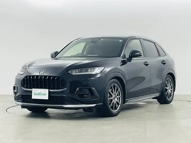 ホンダ ＺＲ－Ｖ ハイブリッド e:HEV Z 福島県 2023(令5)年 1.5万km クリスタルブラックパール 純正ディスプレイオーディオ/【Bluetooth/USB/AppleCarPlay/AndroidAuto/フルセグTV】/・全方位カメラ/・置くだけ充電/・BOSEサウンド/・ETC2.0/ホンダセンシング/・衝突軽減ブレーキ/・先行車発進お知らせ機能/・歩行者事故低減ステアリング/・路外逸脱抑制機能/・標識認識機能/・アダプティブクルーズコントロール/・ブラインドスポットモニター/・オートマチックハイビーム/レザーシート/・前席パワーシート/・前席シートヒーター/ステアリングスイッチ/・ステアリングヒーター/・パドルシフト/純正エアロ/LEDヘッドライト/・オートライト/純正18インチアルミホイール/前席純正フロアマット/ABS/横滑り防止装置/ダウンヒルアシスト/プッシュスタート/・スマートキー/・スペアキー/取扱説明書/・保証書