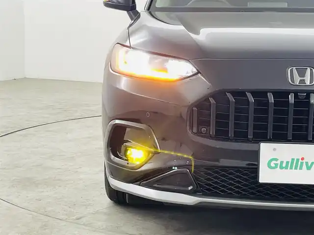ホンダ ＺＲ－Ｖ ハイブリッド e:HEV Z 福島県 2023(令5)年 1.5万km クリスタルブラックパール 純正ディスプレイオーディオ/【Bluetooth/USB/AppleCarPlay/AndroidAuto/フルセグTV】/・全方位カメラ/・置くだけ充電/・BOSEサウンド/・ETC2.0/ホンダセンシング/・衝突軽減ブレーキ/・先行車発進お知らせ機能/・歩行者事故低減ステアリング/・路外逸脱抑制機能/・標識認識機能/・アダプティブクルーズコントロール/・ブラインドスポットモニター/・オートマチックハイビーム/レザーシート/・前席パワーシート/・前席シートヒーター/ステアリングスイッチ/・ステアリングヒーター/・パドルシフト/純正エアロ/LEDヘッドライト/・オートライト/純正18インチアルミホイール/前席純正フロアマット/ABS/横滑り防止装置/ダウンヒルアシスト/プッシュスタート/・スマートキー/・スペアキー/取扱説明書/・保証書