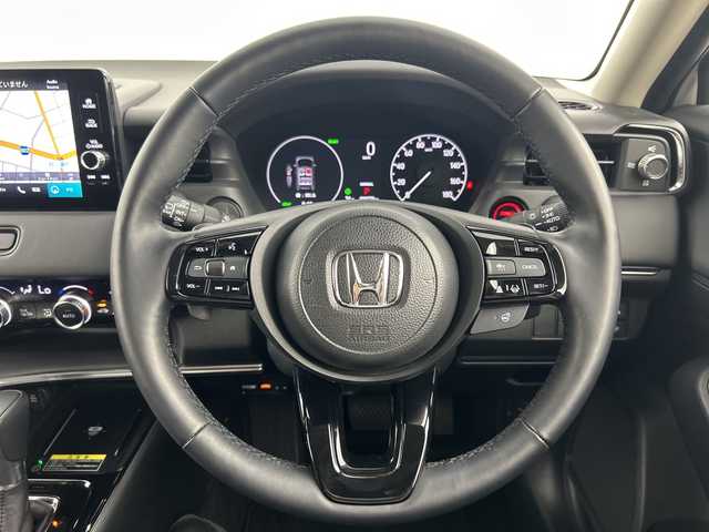 ホンダ ヴェゼル ハイブリッド e:HEV Z 愛知県 2024(令6)年 0.9万km プラチナホワイトパール ワンオーナー/禁煙車/純正9インチナビ/（AM/FM/Bluetooth/USB/フルセグTV）/バックカメラ/シーケンシャルウインカー/ワイヤレス充電/ホンダセンシング/・衝突軽減ブレーキ/・レーダークルーズコントロール/・レーンキープアシスト/・オートマチックハイビーム/・ブラインドスポットモニター/・クリアランスソナー/ダウンヒルアシスト/ETC2.0/ステアリングヒーター/シートヒーター/パドルシフト/スマートキー/プッシュスタート/LEDヘッドライト/フロントフォグライト/純正18インチアルミホイール/純正フロアマット