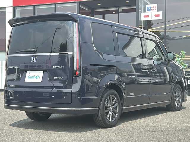 ホンダ ステップワゴン スパーダ eHEV 大阪府 2023(令5)年 1万km トワイライトミストブラックパール 純正１１．４インチナビ/純正１５．６インチフリップダウンモニター/両側パワースライドドア/前席シートヒーター /フルセグＴＶ/Ｂｌｕｅｔｏｏｔｈ/ＣＤ／ＤＶＤ/ＵＳＢ端子/レーダークルーズコントロール/電動リアゲート/オットマン/ブレーキホールド/BSM/ETC/スマートキー/LEDヘッドライト/取扱説明書/保証書