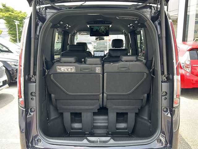 ホンダ ステップワゴン スパーダ eHEV 大阪府 2023(令5)年 1万km トワイライトミストブラックパール 純正１１．４インチナビ/純正１５．６インチフリップダウンモニター/両側パワースライドドア/前席シートヒーター /フルセグＴＶ/Ｂｌｕｅｔｏｏｔｈ/ＣＤ／ＤＶＤ/ＵＳＢ端子/レーダークルーズコントロール/電動リアゲート/オットマン/ブレーキホールド/BSM/ETC/スマートキー/LEDヘッドライト/取扱説明書/保証書