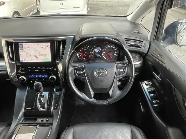 トヨタ ヴェルファイア Z Gエディション 静岡県 2020(令2)年 6.4万km ブラック １オーナー　/トヨタセーフティセンス　（LTA/PKSB/PCS/RSA）/ACC　/クリアランスソナー　/両側パワスラ/パワーリアゲート /純正ナビ　/地デジ　/Ｂカメラ　/純正後席モニター　/レザーシート/運転席メモリー付きPWシート/ＰＷシート　/シートヒーター　　/エアシート　/三眼ＬＥＤライト/オートハイビーム/ステアリングスイッチ /ウッドコンビステアリング /木目調パネル/純正18インチAW/社外前後ドラレコ /スマートキー /スペアキー /保証書/取説