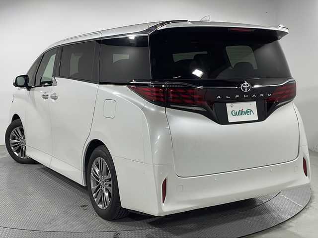 トヨタ アルファード Z 広島県 2024(令6)年 1万km プラチナホワイトパールマイカ 禁煙車/純正１４型コネクティッドナビ/サンルーフ/フリップダウンモニター/ユニバーサルステップ/パワーシート/温冷シート/ブラインドスポットモニター/パーキングアシスト/両側パワースライドドア/電動リアゲート/デジタルインナーミラー/ヘッドアップディスプレイ/ワイヤレス充電/レーダークルーズコントロール/レーンキープ/衝突軽減/踏み間違い防止/オットマン/ステアリングヒーター/100V電源/純正18インチアルミホイール(225/60/R18)/エアバッグ(運転席/助手席/サイド/カーテン)