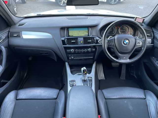 ＢＭＷ Ｘ３ xDrive20d Mスポーツ 愛知県 2015(平27)年 11.7万km アルピンホワイトⅢ /禁煙車//メーカーHDDナビ//BT/AUX/USB/フルセグTV/MUSICコレクション//バックカメラ//フロントカメラ//レーダー探知機//純正18インチアルミホイール//プッシュスタート//スマートキー//スペアスマートキー//パワーバックドア//ルーフレール//トノカバー//ハーフレザーシート//メモリー機能付きパワーシート//オートHIDヘッドライト//フォグランプ//革巻きステアリング//パドルシフト//ステアリングスイッチ//ステアリングチルト＆テレスコピック機構//クルーズコントロール//アイドリングストップ//インテリジェントセーフティー//リアデフォッガー//ダウンヒルアシストコントロール//横滑り防止装置//クリアランスソナー//各種運転モード(SPORT/ECOPRO)//ウィンカーミラー//バニティミラーランプ付バイザー//防眩機能付きルームミラー//Wエアバッグ＋サイド//カーテンエアバッグ//記録簿//保証書//取扱説明書