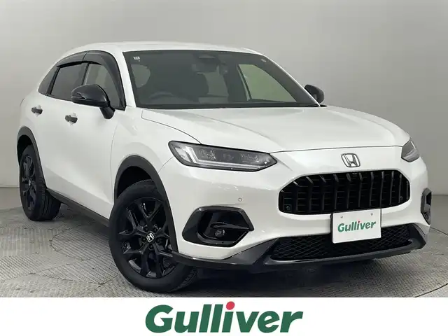ホンダ ＺＲ－Ｖ ハイブリッド e:HEV Z ブラックスタイル 道央・札幌 2024(令6)年 1.6万km プラチナホワイトパール ・ワンオーナー/・純正メモリナビ/・BT/USB/AppleCarPlay/AndroidAuto/・アラウンドビューモニター/・ＢＯＳＥサウンド/・前後ドライブレコーダー/・ビルトインETC2.0/・ホンダセンシング/・衝突軽減ブレーキ/・横滑り防止装置/・アダプティブクルーズコントロール/・ブラインドスポットモニター/・踏み間違い防止機能/・前後コーナーセンサー/・アイドリングストップ/・ダウンヒルアシストコントロール/・レザーシート/・全席シートヒーター/・前席パワーシート/・ステアリングヒーター/・ワイヤレス充電/・パドルシフト/・LEDヘッドライト/・フォグ/・保証書・取扱説明書/・スペアキー