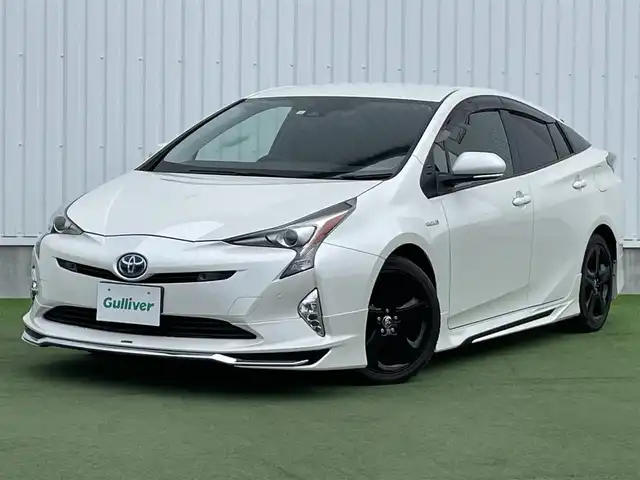 トヨタ プリウス A ツーリングセレクション 香川県 2016(平28)年 6.9万km ホワイトパールクリスタルシャイン 純正７型ナビ　（品番：NSZT-W64）/フルセグテレビ/Bluetooth　CD DVD/バックカメラ/衝突被害軽減システム/車線逸脱警報/横滑り防止装置/インテリジェントクリアランスソナー/シンプルインテリジェントパーキングアシスト/前方ドライブレコーダー/オートマチックハイビーム/オートライト/LEDヘッドライト/合皮シート/運転席側・助手席側シートヒーター/モデリスタエアロ　（フロント・サイド）/ヘッドアップディスプレイ/純正フロアマット/純正17インチアルミホイール/ハンドルスイッチ/プッシュスタート/ETC