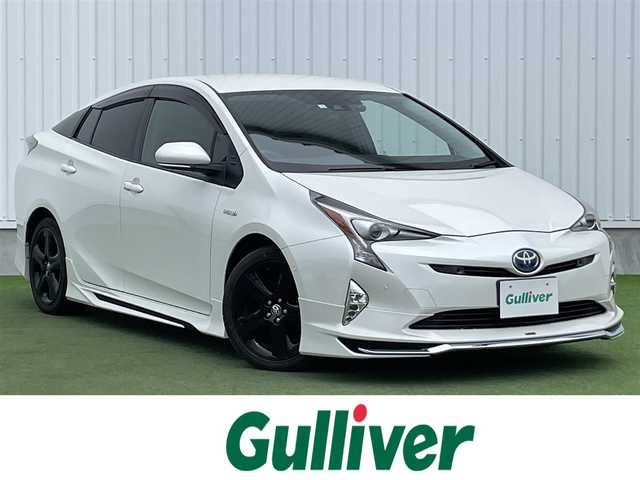 トヨタ プリウス A ツーリングセレクション 香川県 2016(平28)年 6.9万km ホワイトパールクリスタルシャイン 純正7型ナビ　（品番：NSZT-W64）/フルセグテレビ/Bluetooth　CD DVD/バックカメラ/衝突被害軽減システム/車線逸脱警報/横滑り防止装置/インテリジェントクリアランスソナー/シンプルインテリジェントパーキングアシスト/前方ドライブレコーダー/オートマチックハイビーム/オートライト/LEDヘッドライト/合皮シート/運転席側・助手席側シートヒーター/モデリスタエアロ　（フロント・サイド）/ヘッドアップディスプレイ/純正フロアマット/純正17インチアルミホイール/ハンドルスイッチ/プッシュスタート/ETC