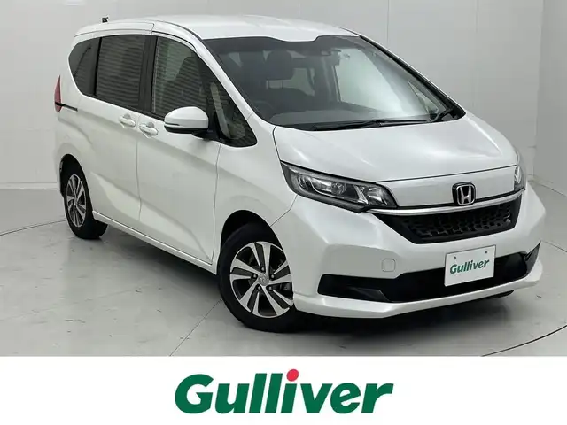 ホンダ フリード G ホンダセンシング 茨城県 2020(令2)年 3万km プラチナホワイトパール 社外ナビ［AVIC-RL910］/フルセグ再生可/バックカメラ/Honda SENSING/・アダプティブ/・アダプティブクルーズコントロール/・衝突軽減ブレーキ/・誤発進抑制機能/・車線逸脱抑制機能/・車線維持支援システム/ハーフレーザシート/シートヒーター/両側パワースライドドア/純正アルミホイール/純正フロアマット/ビルトインETC/ドライブレコーダー