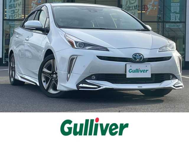 トヨタ プリウス Sツーリングセレクション 岡山県 2020(令2)年 4.1万km プラチナホワイトパールマイカ 登録時走行距離：40833km/禁煙車/モデリスタエアロ/全方位カメラ/純正9インチSDナビ（WSZT-Y68T）/・CD/フルセグTV/Bluetooth/AM/FM/トヨタセーフティーセンス/・PCS（衝突軽減システム）/・オートマチックハイビーム/・レーダークルーズコントロール/・LTA（レーンアシスト）/・先行車発進告知/・ふらつき警報/・ロードサインアシスト（標識認識機能）/ビルトインETC/クリアランスソナー/シートヒーター（D・N席）/純正17インチアルミホイール/純正フロアマット/ステアリングスイッチ/LEDヘッドライト/フォグライト/ドアバイザー/電動格納ミラー/オートリトラミラー/プッシュスタート/スマートキー/スペアキー/取扱説明書