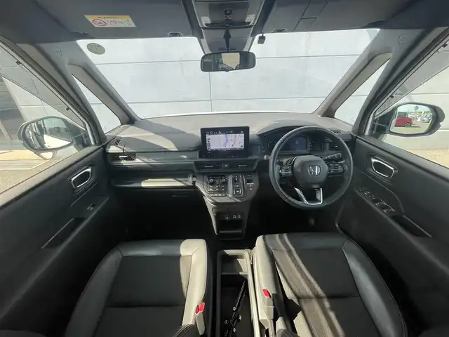 ホンダ ステップワゴン スパーダ eHEV 千葉県 2023(令5)年 1.9万km プラチナホワイトパール ホンダセンシング/純正ナビ /【型式：LXM-237VFNi】/ラジオ/CD/DVD/Bluetooth/USB /アップルカープレイ/アンドロイドオート　/両側パワ－スライドドア /マルチビューカメラシステム /ETC　/後席フリップダウンモニター　/オートライト　/オートハイビーム/LEDヘッドライト/D/N席シートヒーター/純正アルミホイール/電動リアゲート/オットマン/カーテンエアバック/ブラインドスポットモニター/ウォークスルー