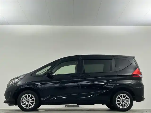 ホンダ フリード ハイブリット G ホンダセンシング 埼玉県 2019(平31)年 2.7万km プレミアムスパークルブラックパール 純正９型ナビ　フリップダウンモニター　バックカメラ　両側パワースライドドア　シートヒーター　ホンダセンシング　ＬＥＤヘッドライト　ビルトインETC　フォグランプ　スマートキー　フロアマット　禁煙車