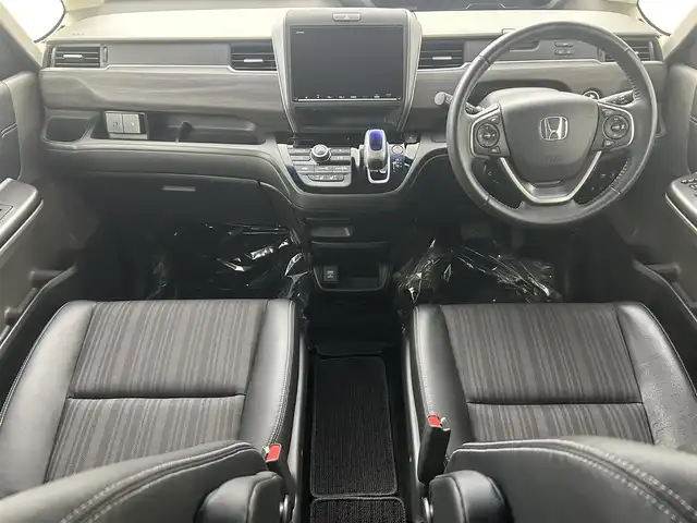 ホンダ フリード ハイブリット G ホンダセンシング 埼玉県 2019(平31)年 2.7万km プレミアムスパークルブラックパール 純正９型ナビ　フリップダウンモニター　バックカメラ　両側パワースライドドア　シートヒーター　ホンダセンシング　ＬＥＤヘッドライト　ビルトインETC　フォグランプ　スマートキー　フロアマット　禁煙車
