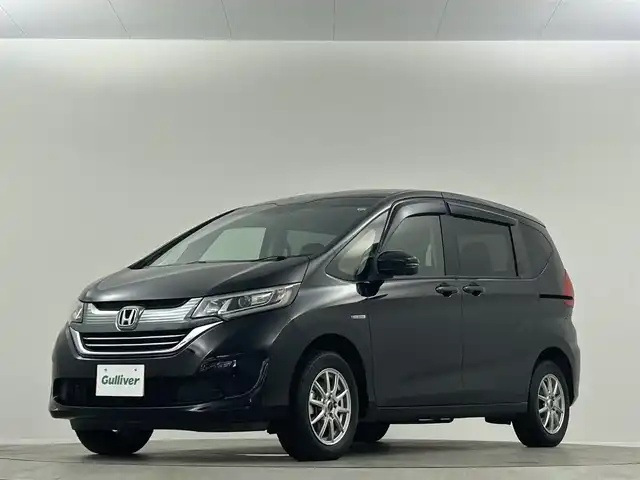 ホンダ フリード ハイブリット G ホンダセンシング 埼玉県 2019(平31)年 2.7万km プレミアムスパークルブラックパール 純正９型ナビ　フリップダウンモニター　バックカメラ　両側パワースライドドア　シートヒーター　ホンダセンシング　ＬＥＤヘッドライト　ビルトインETC　フォグランプ　スマートキー　フロアマット　禁煙車