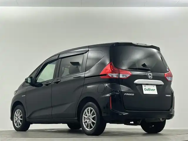 ホンダ フリード ハイブリット G ホンダセンシング 埼玉県 2019(平31)年 2.7万km プレミアムスパークルブラックパール 純正９型ナビ　フリップダウンモニター　バックカメラ　両側パワースライドドア　シートヒーター　ホンダセンシング　ＬＥＤヘッドライト　ビルトインETC　フォグランプ　スマートキー　フロアマット　禁煙車