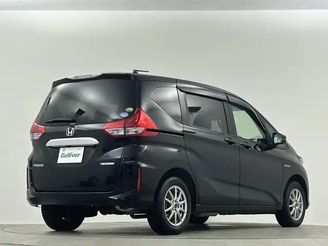 ホンダ フリード ハイブリット G ホンダセンシング 埼玉県 2019(平31)年 2.7万km プレミアムスパークルブラックパール 純正９型ナビ　フリップダウンモニター　バックカメラ　両側パワースライドドア　シートヒーター　ホンダセンシング　ＬＥＤヘッドライト　ビルトインETC　フォグランプ　スマートキー　フロアマット　禁煙車