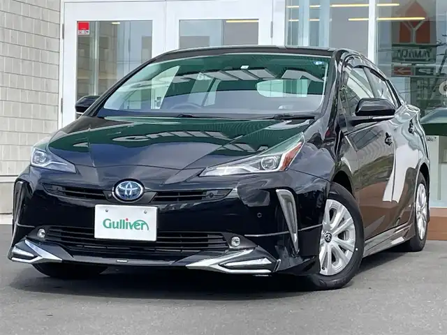 トヨタ プリウス SセーフティプラスⅡ 道央・札幌 2022(令4)年 3.2万km アティチュードブラックマイカ ・４WD/・ワンオーナー/・純正ディスプレイオーディオ/・寒冷地仕様/・アラウンドビューモニター/・モデリスタフルエアロ/・純正エンジンスターター/・ブラインドスポットモニター/・衝突被害軽減システム/・横滑り防止装置/・レーンキープアシスト/・レーダークルーズ/・オートハイビーム/・アクセサリーコンセント AC100V/・アイドリングストップ/・ドアバイザー/・ウィンカーミラー/・電動格納ミラー/・プッシュスタート/・純正フロアマット/・取扱説明書/・保証書/・スマートキー/・スペアキー