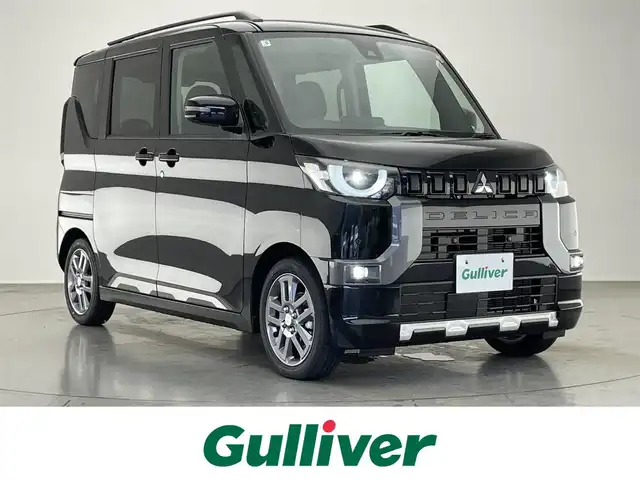 三菱 デリカミニ T プレミアム 愛知県 2025(令7)年 0.1千km アメジストブラック T　PREMIUM　/9型ディスプレイオーディオ（121330）　/サイドデカール（33440）/届出済未使用車　純正９型ＤＡ　デジイン　マイパイロット　ハンズフリーパワスラ　全方位カメラ　シートヒーター　ｅ－アシスト　衝突軽減　追従クルコン　ダウンヒルアシスト　ＬＥＤオートライト　パドルシフト　ルーフレール　オートハイビーム　レーンキープ　後退出庫サポート　黒ハーフレザー　アイドリングストップ　純正AW　カーテンエアバッグ　プッシュスタート　スマートキー　デジタルインナーミラー　カープレイ対応　AppleCarPlay AndroidAuto