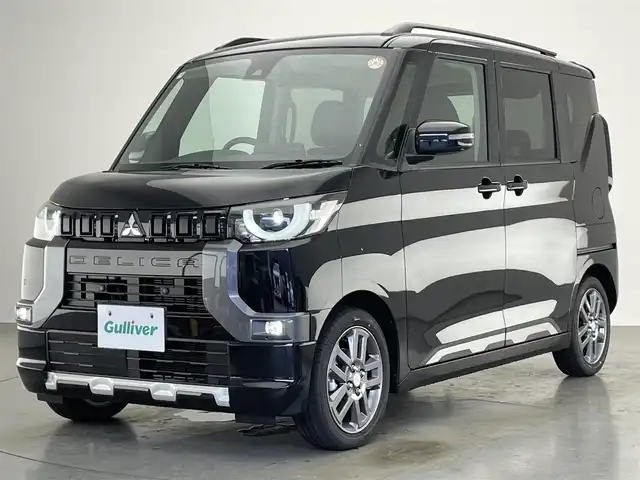 三菱 デリカミニ T プレミアム 愛知県 2025(令7)年 0.1千km アメジストブラック T　PREMIUM　/9型ディスプレイオーディオ（121330）　/サイドデカール（33440）/届出済未使用車　純正９型ＤＡ　デジイン　マイパイロット　ハンズフリーパワスラ　全方位カメラ　シートヒーター　ｅ－アシスト　衝突軽減　追従クルコン　ダウンヒルアシスト　ＬＥＤオートライト　パドルシフト　ルーフレール　オートハイビーム　レーンキープ　後退出庫サポート　黒ハーフレザー　アイドリングストップ　純正AW　カーテンエアバッグ　プッシュスタート　スマートキー　デジタルインナーミラー　カープレイ対応　AppleCarPlay AndroidAuto