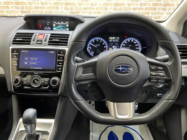スバル レヴォーグ 1．6GT－S アイサイト 岩手県 2015(平27)年 8.6万km クリスタルホワイトP ４WD/サンルーフ/ビルシュタインダンパー/アイサイトVer.3/アドバンスドセイフティパッケージ/プリクラッシュブレーキ/全車速追従機能付きクルーズコントロール/アクティブレーンキープ/AT誤発進抑制制御/先行車発進告知/リヤビークルディテクション/ハイビームアシスト/横滑り防止装置/アイドリングストップ/パドルシフト/前席パワーシート/純正ナビ/フルセグTV/サイド・バックカメラ/ドライブレコーダー/ETC/LEDヘッドライト/フロント・リヤフォグランプ/純正18インチアルミホイール