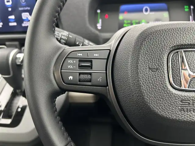 ホンダ フリード ハイブリット e:HEV AIR EX 千葉県 2025(令7)年 0.1千km プラチナホワイトパール 登録済未使用車/純正9インチコネクトナビ/・LXM-242ZFNi/・BT/ACP/AA/フルセグ/Honda SENSING/・衝突軽減ブレーキ（CMBS）/・先行車発進お知らせ機能/・歩行者事故低減ステアリング/・路外逸脱抑制機能/・標識認識機能/・渋滞追従機能付アダプティブクルーズコントロール（ACC）/・車線維持支援システム（LKAS）/・トラフィックジャムアシスト（渋滞運転支援機能）/・ブラインドスポットインフォメーション/・誤発進抑制機能/・後方誤発進抑制機能/・近距離衝突軽減ブレーキ/・急アクセル抑制機能/・パーキングセンサーシステム/・オートハイビーム/両側パワースライドドア/バックカメラ/前席シートヒーター/リアクーラー/2列目キャプテンシート(両側アームレスト付)/コーナーセンサー/スマートキー/スペアキー/純正15インチアルミホイール/取説・保証書/LEDヘッドライト/オートライト/コーナーセンサー/スマートキー/スペアキー/純正15インチアルミホイール/取説・保証書