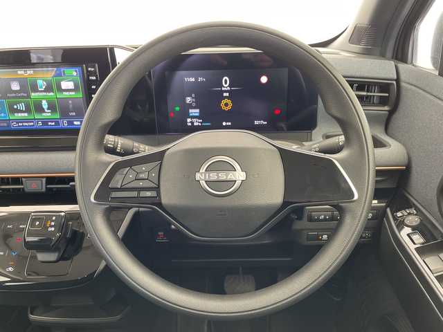 日産 サクラ X 愛知県 2023(令5)年 0.4万km アッシュブラウンM 純正9型ディスプレイオーディオ　ナビ機能なし/バックカメラ/コーナーセンサー/純正アルミホイール/LEDヘッドライト/オートライト/ETC/衝突軽減システム/Bluetooth/ステアリングスイッチ/スマートキー/プッシュスタート