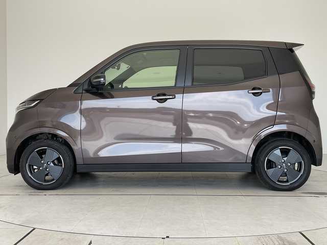 日産 サクラ X 愛知県 2023(令5)年 0.4万km アッシュブラウンM 純正9型ディスプレイオーディオ　ナビ機能なし/バックカメラ/コーナーセンサー/純正アルミホイール/LEDヘッドライト/オートライト/ETC/衝突軽減システム/Bluetooth/ステアリングスイッチ/スマートキー/プッシュスタート