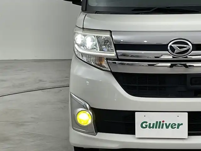 ダイハツ タント カスタム X スマートセレ SA 福岡県 2014(平26)年 6万km パールホワイトⅢ 社外ナビ（ＢＴ，フルセグＴＶ）　/バックカメラ　/ＥＴＣ　/衝突被害軽減ブレーキ　/横滑り防止装置　/アイドリングストップ　/片側電動スライドドア　/エンジンスタートボタン　/ステアリングリモコン　/電動格納ドアミラー