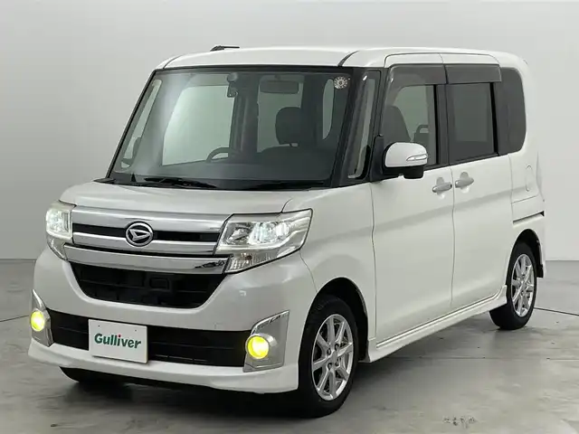 ダイハツ タント カスタム X スマートセレ SA 福岡県 2014(平26)年 6万km パールホワイトⅢ 社外ナビ（ＢＴ，フルセグＴＶ）　/バックカメラ　/ＥＴＣ　/衝突被害軽減ブレーキ　/横滑り防止装置　/アイドリングストップ　/片側電動スライドドア　/エンジンスタートボタン　/ステアリングリモコン　/電動格納ドアミラー