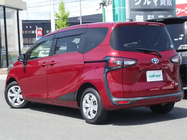 トヨタ シエンタ ハイブリッド ファンベースG セーフティED 静岡県 2021(令3)年 1.4万km センシュアルレッドマイカ 走行距離14千キロ/トヨタセーフティセンス/　・プリクラッシュセーフティ/　・レーンディパーチャーアラート/　・オートマチックハイビーム/　・先行車発進のお知らせ/インテリジェントクリアランスソナー/クルーズコントロール/純正9インチSDナビ/　CD/DVD/SD/BT/フルセグTV/パノラミックビューモニター（フロント／サイド／リア）/社外前後ドライブレコーダー/ビルトインETC/両側パワースライドドア/前席シートヒーター/ステアリングヒーター/純正LEDヘッドライト/プッシュスタート／スマートキー/純正フロアマット／ドアバイザー/取扱説明書／保証書/　
