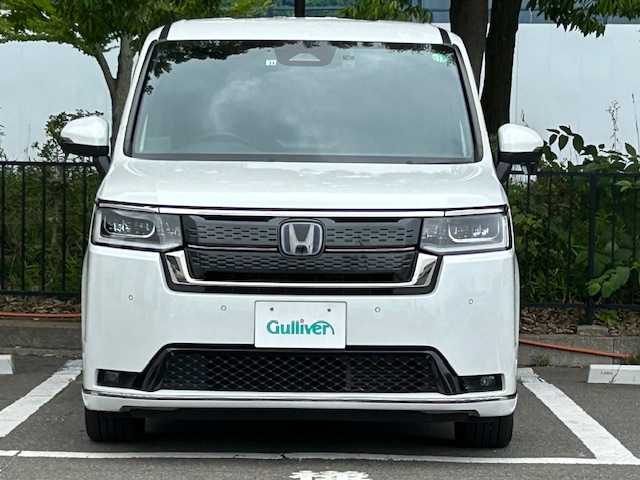 ホンダ ステップワゴン スパーダ eHEV 宮城県 2022(令4)年 5.8万km プラチナホワイトパール クルーズコントロール/レーンキープアシスト/シートヒーター/オートライト/純正SDナビ/デジタルインナーミラー/電動リアゲート/コーナーセンサー前後/純正ビルドインETC2.0/フルセグTV/Bluetooth接続/バックカメラ/ハーフレザーシート/両側パワースライドドア/ドライブレコーダー前後/オットマン/3列シート/フルフラットシート/純正フロアマット/LEDヘッドライト