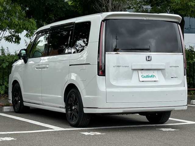 ホンダ ステップワゴン スパーダ eHEV 宮城県 2022(令4)年 5.8万km プラチナホワイトパール クルーズコントロール/レーンキープアシスト/シートヒーター/オートライト/純正SDナビ/デジタルインナーミラー/電動リアゲート/コーナーセンサー前後/純正ビルドインETC2.0/フルセグTV/Bluetooth接続/バックカメラ/ハーフレザーシート/両側パワースライドドア/ドライブレコーダー前後/オットマン/3列シート/フルフラットシート/純正フロアマット/LEDヘッドライト