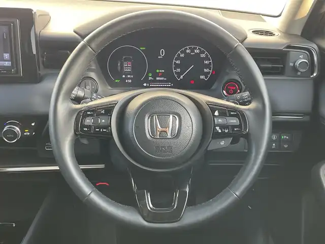 ホンダ ヴェゼル ハイブリッド e:HEV Z 滋賀県 2024(令6)年 0.6万km サンドカーキパール 社外ナビ/(Bluetooth/AM/FM)/衝突軽減ブレーキ/アダプティブクルーズコントロール/レーンキープアシスト/ブラインドスポットモニター/バックカメラ/コーナーセンサー/電動リアーゲート/ハーフレザーシート/シートヒーター/ステアリングヒーター/電動パーキング/ブレーキホールド/LEDオートライト/オートハイビーム/フォグ/パドルシフト/ETC/USB/寒冷地仕様