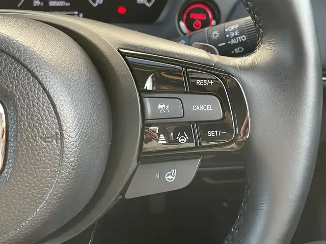 ホンダ ヴェゼル ハイブリッド e:HEV Z 滋賀県 2024(令6)年 0.6万km サンドカーキパール 社外ナビ/(Bluetooth/AM/FM)/衝突軽減ブレーキ/アダプティブクルーズコントロール/レーンキープアシスト/ブラインドスポットモニター/バックカメラ/コーナーセンサー/電動リアーゲート/ハーフレザーシート/シートヒーター/ステアリングヒーター/電動パーキング/ブレーキホールド/LEDオートライト/オートハイビーム/フォグ/パドルシフト/ETC/USB/寒冷地仕様
