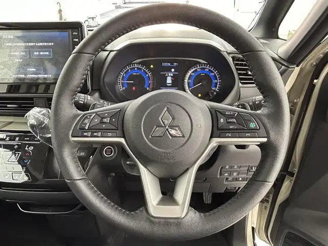 三菱 デリカミニ T プレミアム 大阪府 2025(令7)年 0.1千km ベージュⅡ e-Assist/　・衝突軽減ブレーキ/　・踏み間違い防止アシスト/　・車線逸脱警報機能/　・車線逸脱防止機能/　・オートマチックハイビーム/　・先行車発進お知らせ機能/　・標識認識機能/　・レーダークルーズコントロール/純正ディスプレイオーディオ/　（Bluetooth/USB）/アラウンドビューモニター/両側パワースライドドア/ハーフレザーシート/シートヒーター/LEDヘッドライト/フォグランプ/純正15インチアルミホイール/デジタルインナーミラー/スマートキー