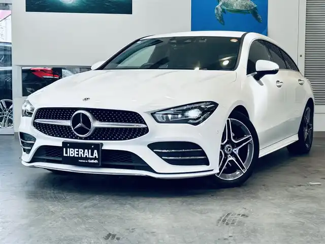 メルセデス・ベンツ ＣＬＡ２００ｄ Sブレーク AMGライン 大阪府 2021(令3)年 4.3万km ポーラホワイト レーダーセーフティP/純正ナビ/ＴＶ/バックカメラ/純正18インチＡＷ/ＬＥＤヘッドライト/アンビエントライト/ＡＣＣ/ブラインドスポット/電動リアゲート/クリアランスソナー/ワイヤレス充電/ハーフ革/メモリ付きパワーシート/シートヒーター