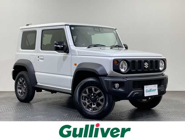 スズキ ジムニー シエラ JC 愛媛県 2024(令6)年 0.6万km ピュアホワイトP 衝突被害軽減システム　ドライブレコーダー　シートヒーター　ダウンヒルアシストコントロール　クルーズコントロール　ヘッドライトウォッシャー　純正１５インチアルミホイール　純正フロアマット　禁煙車