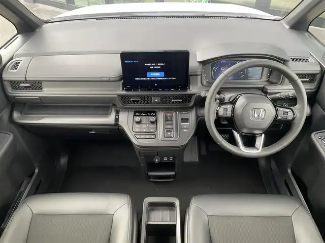 ホンダ ステップワゴン スパーダ eHEV 東京都 2025(令7)年 0.1千km プラチナホワイトパール 登録済未使用車/純正11.4インチナビ/バックカメラ/両側パワースライドドア/パワーテールゲート/レザーシート/シートヒーター/オットマン/パドルシフト/ホンダセンシング/衝突軽減ブレーキ/レーンキープアシスト/レーダークルーズコントロール/ブラインドスポットモニター/コーナーセンサー/LEDヘッドライト/スマートキー