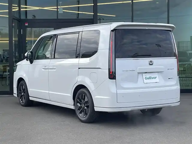 ホンダ ステップワゴン スパーダ eHEV 東京都 2025(令7)年 0.1千km プラチナホワイトパール 登録済未使用車/純正11.4インチナビ/バックカメラ/両側パワースライドドア/パワーテールゲート/レザーシート/シートヒーター/オットマン/パドルシフト/ホンダセンシング/衝突軽減ブレーキ/レーンキープアシスト/レーダークルーズコントロール/ブラインドスポットモニター/コーナーセンサー/LEDヘッドライト/スマートキー