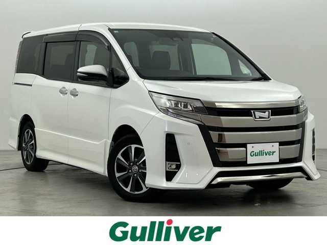 トヨタ ノア Si ダブルバイビーⅡ 福岡県 2020(令2)年 1.9万km ホワイトパールクリスタルシャイン 後席モニター　/純正９型ナビ（フルセグＴＶ）　/バックカメラ　/ビルトインＥＴＣ　/クルーズコントロール　/衝突被害軽減ブレーキ　/レーンキープ　/ＰＫＳＢ　/先行車発進お知らせ　/ＭＴモード付き　/両側電動スライドドア
