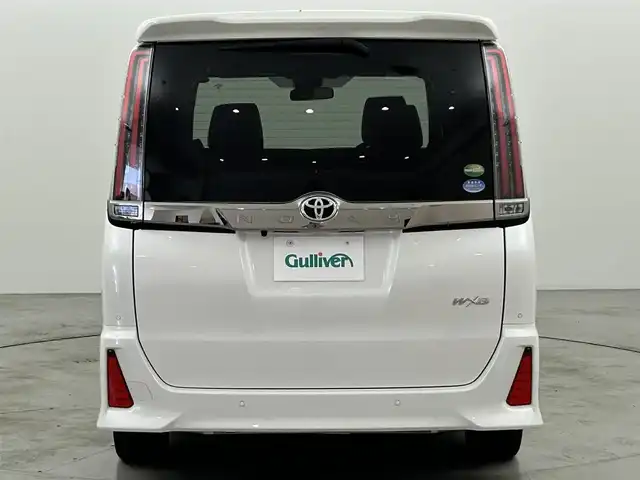 トヨタ ノア Si ダブルバイビーⅡ 福岡県 2020(令2)年 1.9万km ホワイトパールクリスタルシャイン 後席モニター　/純正９型ナビ（フルセグＴＶ）　/バックカメラ　/ビルトインＥＴＣ　/クルーズコントロール　/衝突被害軽減ブレーキ　/レーンキープ　/ＰＫＳＢ　/先行車発進お知らせ　/ＭＴモード付き　/両側電動スライドドア