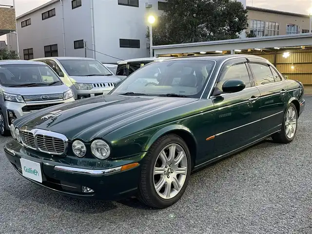 ジャガー ＸＪ８ 4．2 埼玉県 2003(平15)年 13.5万km Ｄグリーン 純正ＤＶＤナビ/ＣＤチェンジャー/全席パワーシート/全席シートヒーター/Ｄ席シートメモリー/後席シートメモリー/リアサンシェード/純正ドアバイザー/純正フロアマット/純正１８インチＡＷ/リモコンキー/保証書