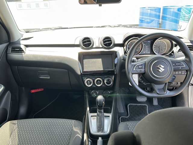 スズキ スイフト HYBRID MG 山口県 2022(令4)年 1.5万km スターシルバーメタリック レーダークルーズコントロール/ビルトインETC/純正フロアマット/オートライト/運転席シートヒーター/パーキングアシスト/アイドリングストップ/スマートキー/スペアキー/プッシュスタート/デュアルカメラブレーキサポート/横滑り防止装置/レーンキープアシスト/盗難防止装置