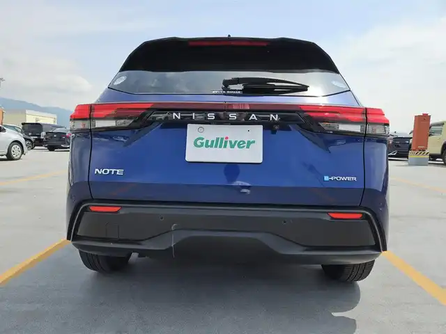日産 ノート X 長崎県 2021(令3)年 6万km オーロラフレアブルーパール 純正ナビ/フルセグTV/インテリジェントアラウンドビューモニター/ビルトインETC2.0/ドライブレコーダー/ソナー機能/全方位運転支援システム/・インテリジェントエマージェンシーブレーキ/・踏み間違い衝突防止アシスト/・標識検知機能/・衝突防止支援システム/・ふらつき警報/・車線逸脱防止支援システム/・後側方車両検知機能/・後退時車両検知機能/SOSコール/インテリジェントルームミラー/純正アダプティブLEDヘッドランプ/LEDフロントフォグランプ/ハイビームアシスト/エアノヴァ16インチアルミホイール/インテリジェントキー/プッシュパワースターター/禁煙車