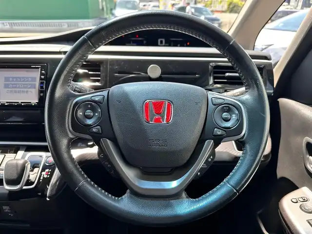 ホンダ ステップワゴン スパーダ ハイブリッド G ホンダセンシング 宮城県 2018(平30)年 5.7万km オブシダンブルーパール ホンダセンシング/●衝突軽減ブレーキ〈CMBS〉/●誤発進抑制機能/●歩行者事故低減ステアリング/●路外逸脱抑制機能/●渋滞追従機能付ACC〈アダプティブ・クルーズ・コントロール〉/●LKAS〈車線維持支援システム〉/●先行車発進お知らせ機能/●標識認識機能/純正ナビ（VXM-194VFi）/・CD/DVD/・Bluetooth/・フルセグTV/バックカメラ/ビルトインETC/ドライブレコーダー/両側パワースライドドア/革巻きステアリング/ステアリングスイッチ/電動パーキングブレーキ/ブレーキホールド/LEDヘッドランプ/フォグランプ/オートライト/スマートキー＆プッシュスタート/電動格納ミラー/フロント・フルオートエアコンディショナー＋リア・マニュアルクーラー/純正16インチAW/純正フロアマット/ドアバイザー/Wエアバッグ