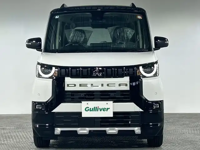 三菱 デリカミニ T プレミアム 神奈川県 2025(令7)年 0.1万km未満 パールⅡ 純正9型ディスプレイオーディオ/マルチアラウンドモニター/両側ハンズフリースライドドア/ハーフレザーシート/e-Assist/衝突被害軽減ブレーキシステム（歩行者検知付き）/踏み間違い衝突防止アシスト/オートマチックハイビーム/標識認識システム/先行車発進通知/車線逸脱警報システム/車線逸脱防止支援機能/ふらつき警報/前方衝突予測警報/デジタルルームミラー/ダウンヒルアシストコントロール/シートヒーター/ステアリングヒーター/パドルシフト/LEDヘッドライト/オートライト/オートマチックハイビーム/フロントフォグランプ/純正15インチAW/スマートキー/スペアキー1本/ルーフレール