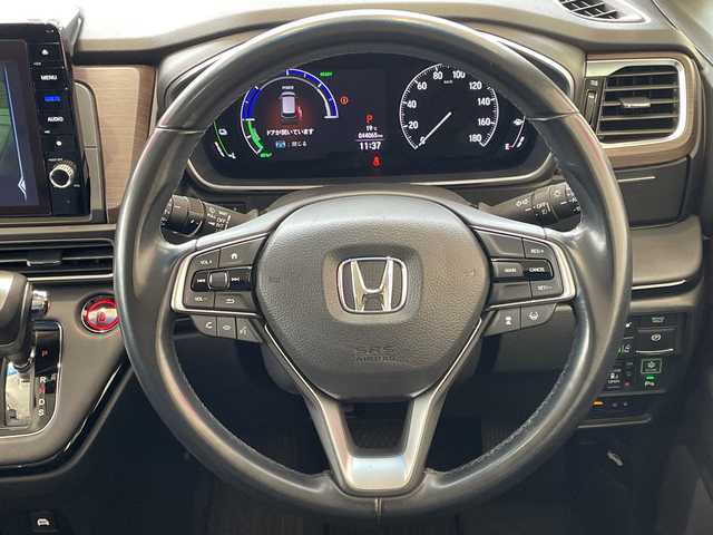 ホンダ オデッセイ ハイブリッド e:HEVアブソルート EX 埼玉県 2021(令3)年 4.4万km プラチナホワイトパール ホンダセンシング /純正10インチメモリナビ/　　CD/DVD/BT/フルセグ/HDMI /全方位カメラ /両側パワースライドドア /パワーバックドア /レーダークルーズコントロール /LEDオートライト /ハーフレザーシート/パワーシート /シートヒーター /純正18インチアルミホイール/ブラインドスポットモニター/ステアリングスイッチ/電子パーキング/純正ETC2.0