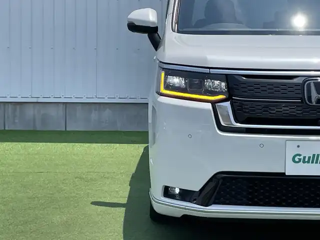 ホンダ ステップワゴン スパーダ eHEV プレミアムライン 香川県 2022(令4)年 3万km プラチナホワイトパール 登録時走行距離：29267km/純正SDナビゲーション/→CD/DVD 再生/→フルセグTV/全方位カメラ/ビルトインETC/ステアリングリモコン/レーダークルーズコントロール/シートヒーター/パワーシート/両側パワースライド/前後コーナーセンサー/LEDオートライト/フォグランプ/電格ウィンカーミラー/レーンキープアシスト/横滑り防止装置/衝突被害軽減システム/スマートキー